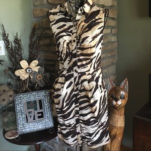 Animal print dress with pockets.