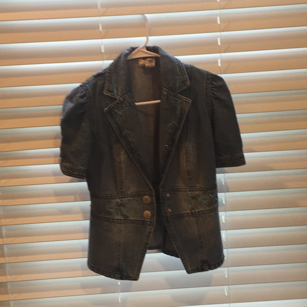 A blue short sleeves jean jacket in size 2