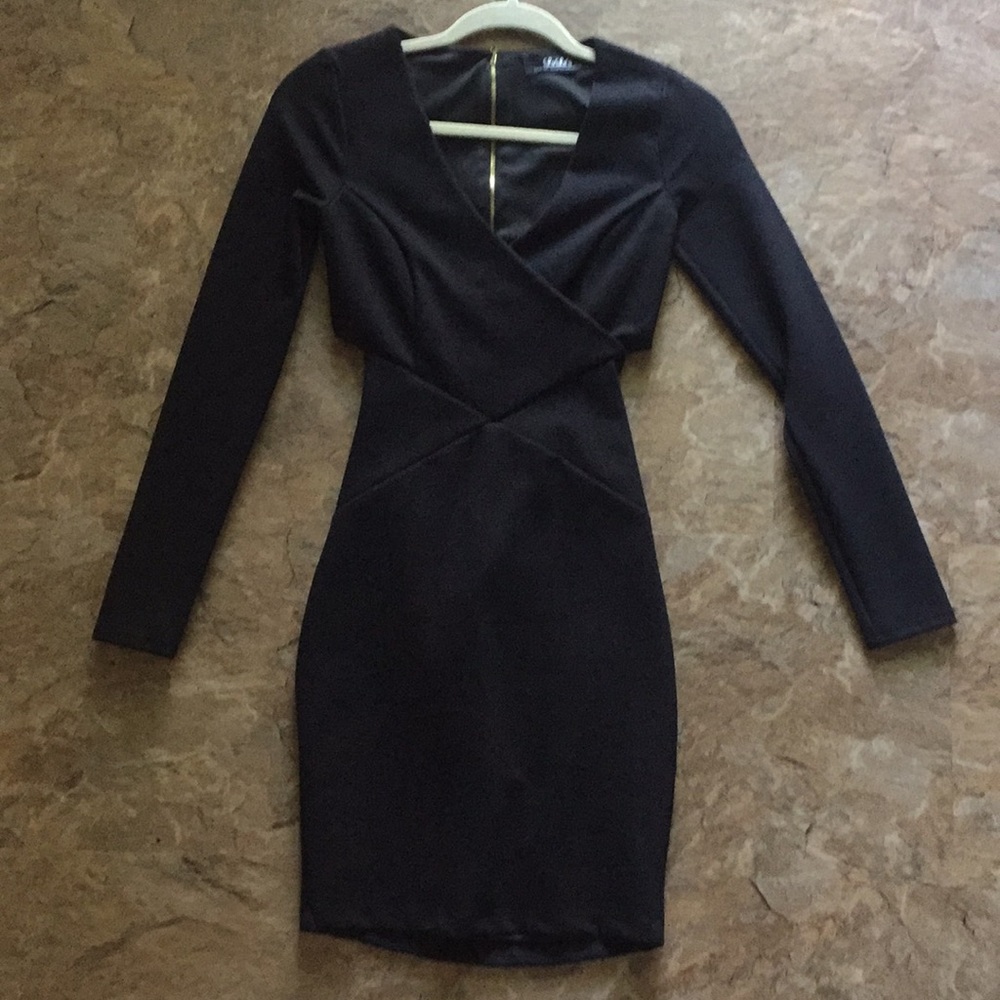 Sexy fitted black mini with back zipper peephole