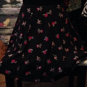 Black flare mini shirt w floral design