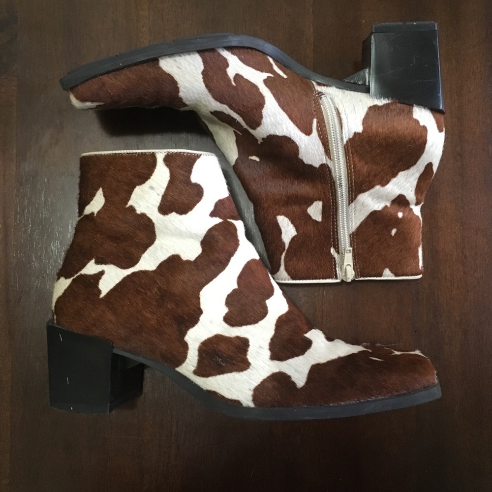 Nine West Cow Print Blocked heel boots.