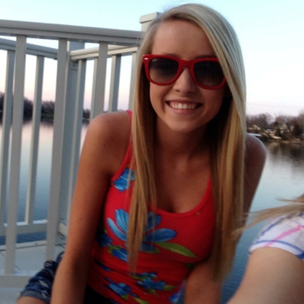 Bright red Hollister tan top with flower print