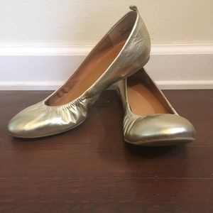 Gold lamé leather flats