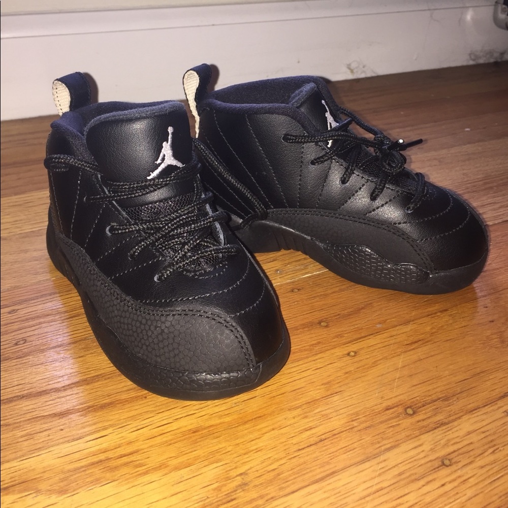 Black toddler Jordan High tops.