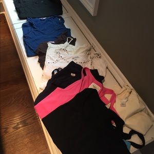 Stack of tank tops ( all small)