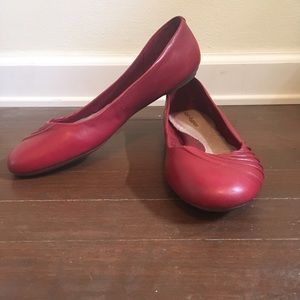 Red leather flats