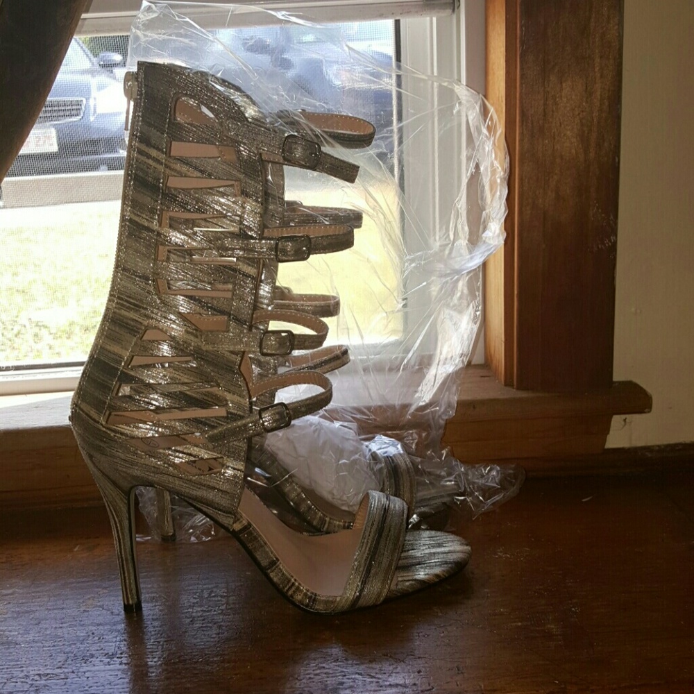 Brand new grey multi strap heels never worn