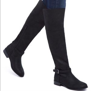 Tall black boots