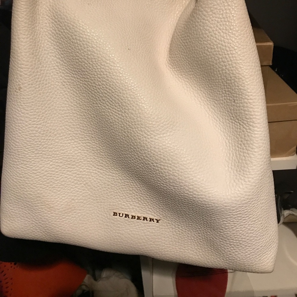 Leather Burberry bag with dust bag.