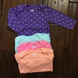 Set of 4 Long sleeve onesies.