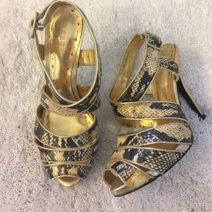 BCBG gold snake heels