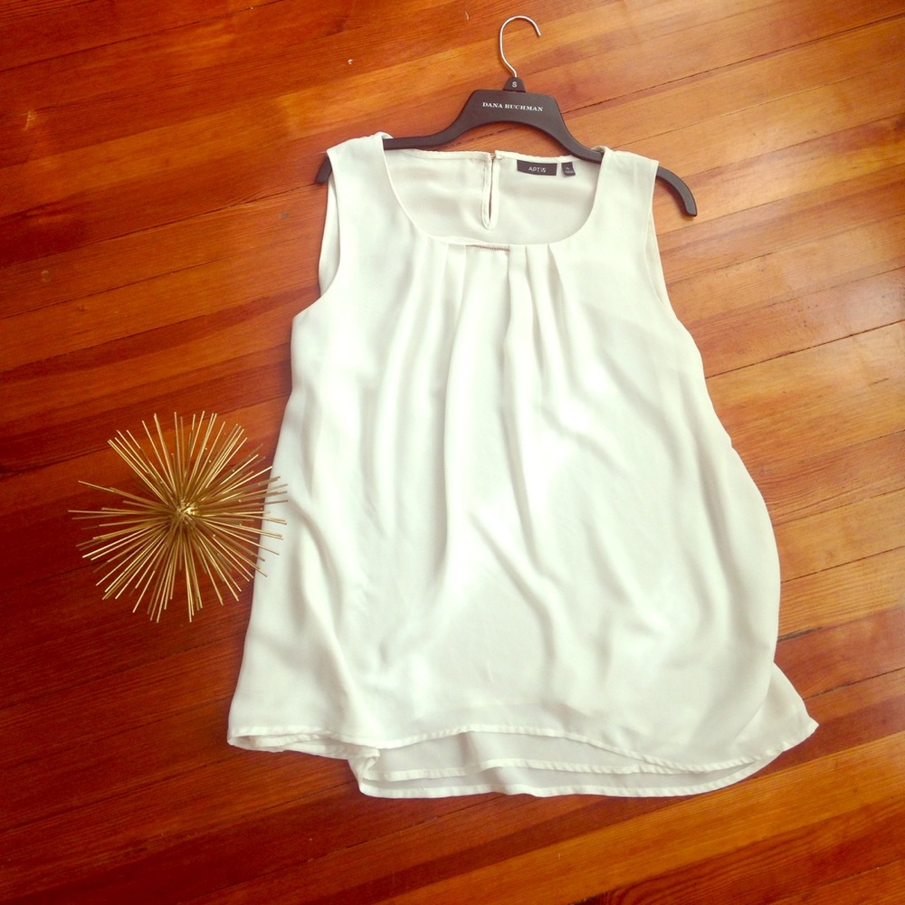 This piece is a flowy white business casual top!