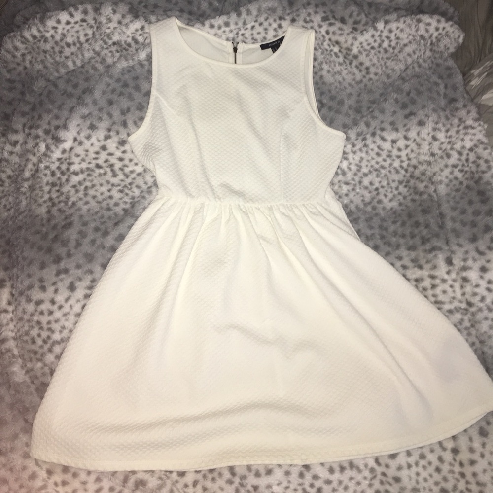 Cream colored textured peplum dress