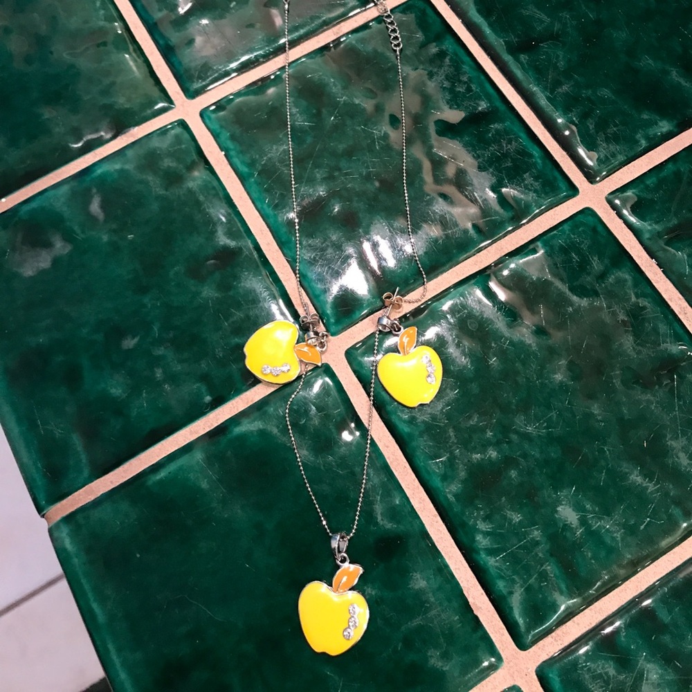 Three piece necklace and earrings
