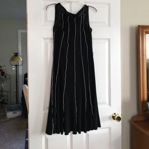 Black dress with white piping