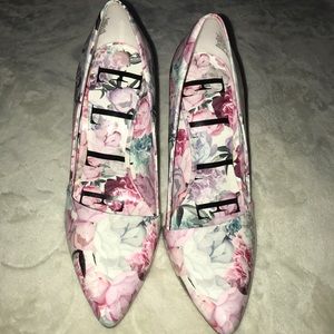 Pink and white floral pumps.