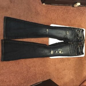 Distressed bootleg jeans