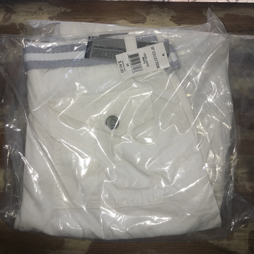 Wrong size. Never worn. Still in packaging.