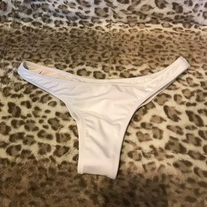 White cheeky Victoria secret bottoms