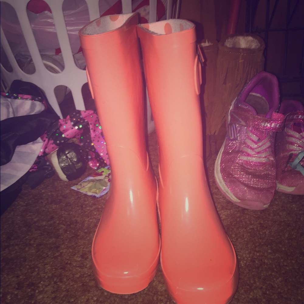 Orange rain boots