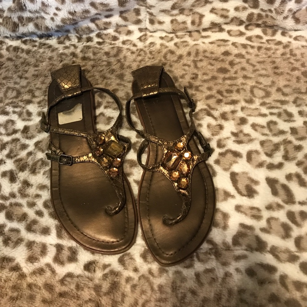 Brown strappy, sparkly sandals .