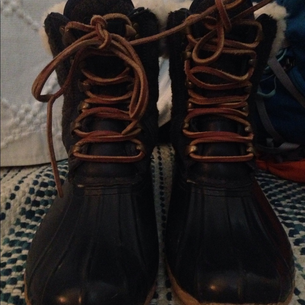 Sperry Topsider boots.