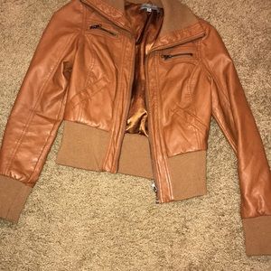 Jacket. Fits shirt in stomach