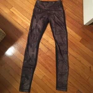 Lululemon leggings. Gold patterned and black.