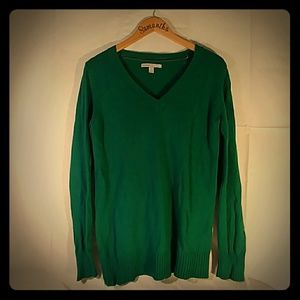 Long sleeve green sweater.