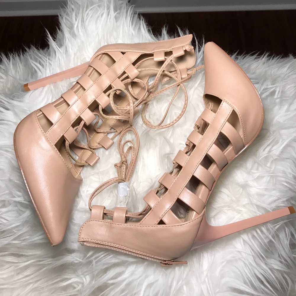 Nude lace-up pumps