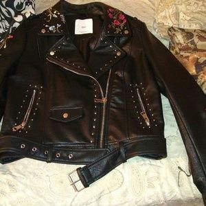 A faux leather flower jacket