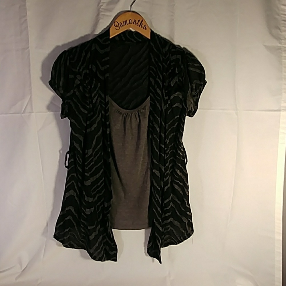 Short leave shirt. Attached tank underneath.