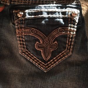 Distressed rock revival skinny jeans