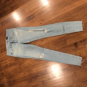 AG super skinny legging ankle, light wash ripped.