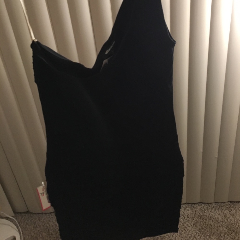 Brand new black dress with gold accent on shoulder