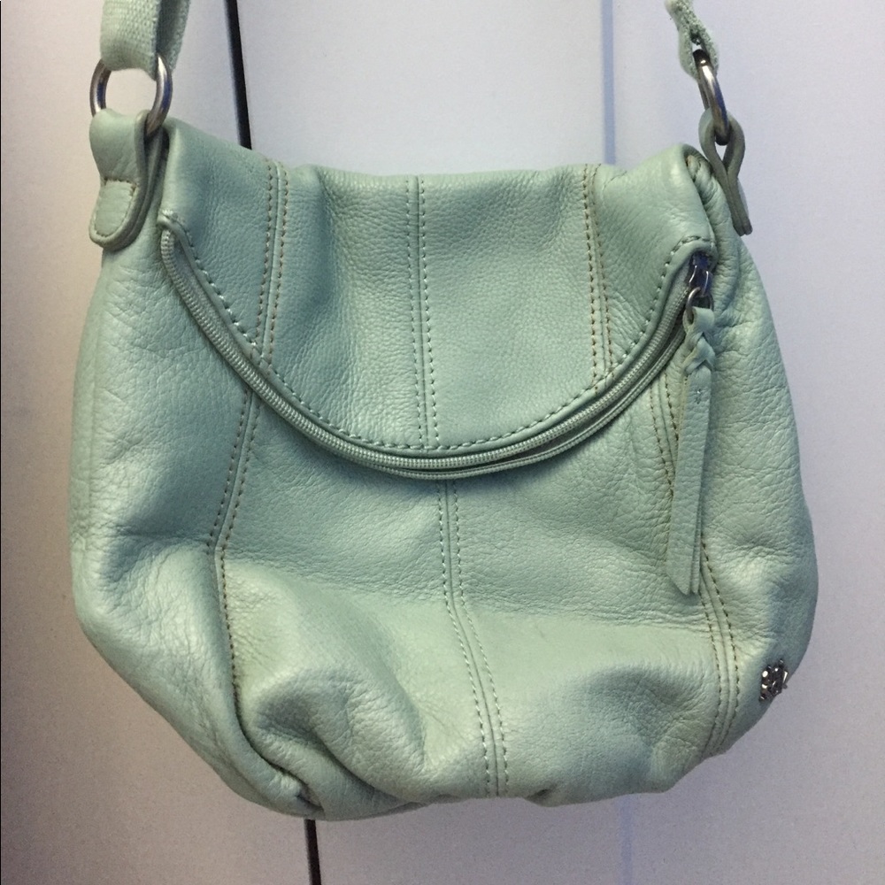 The Sak light teal cross body