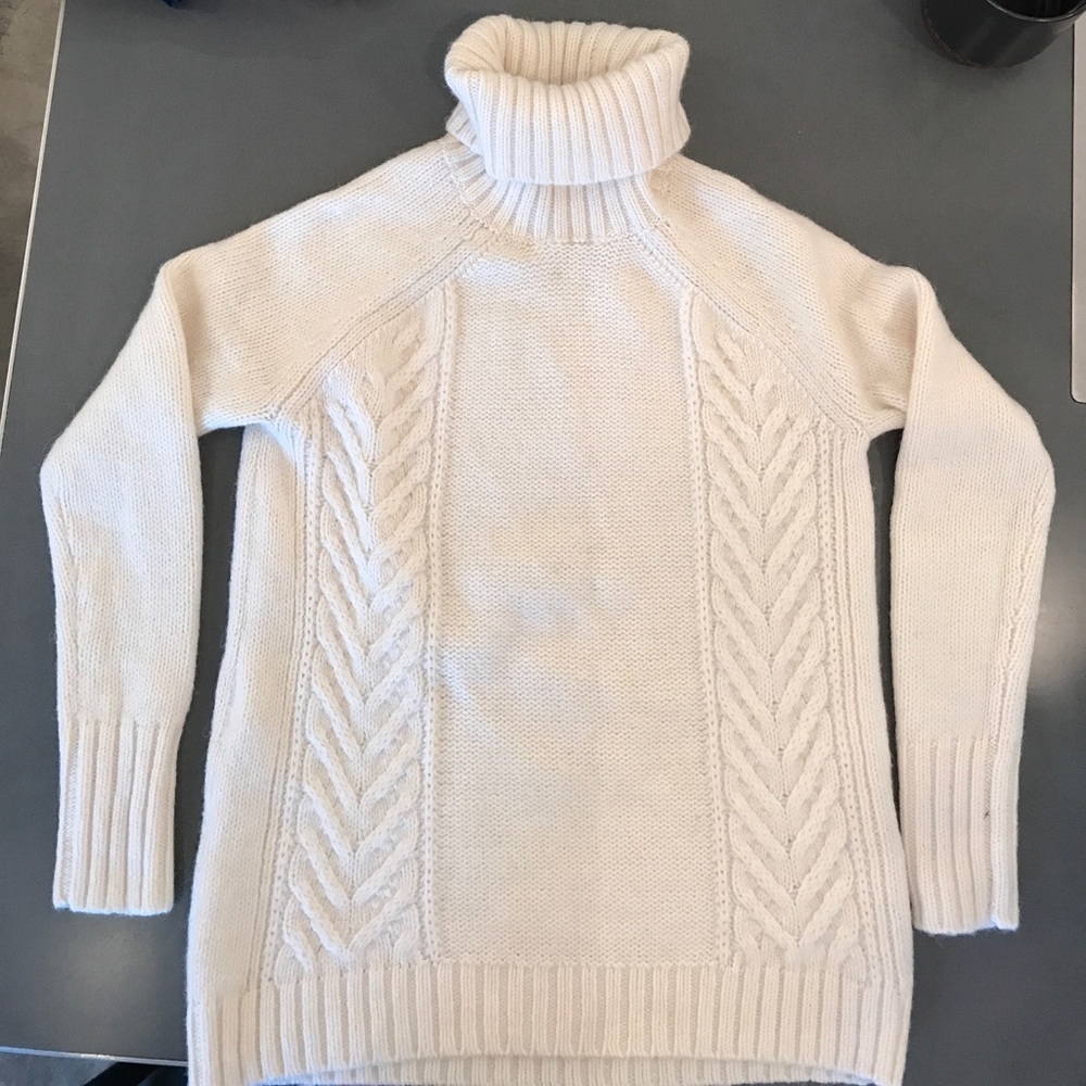 White turtleneck sweater