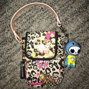 Wristlet with pockets and a keychain