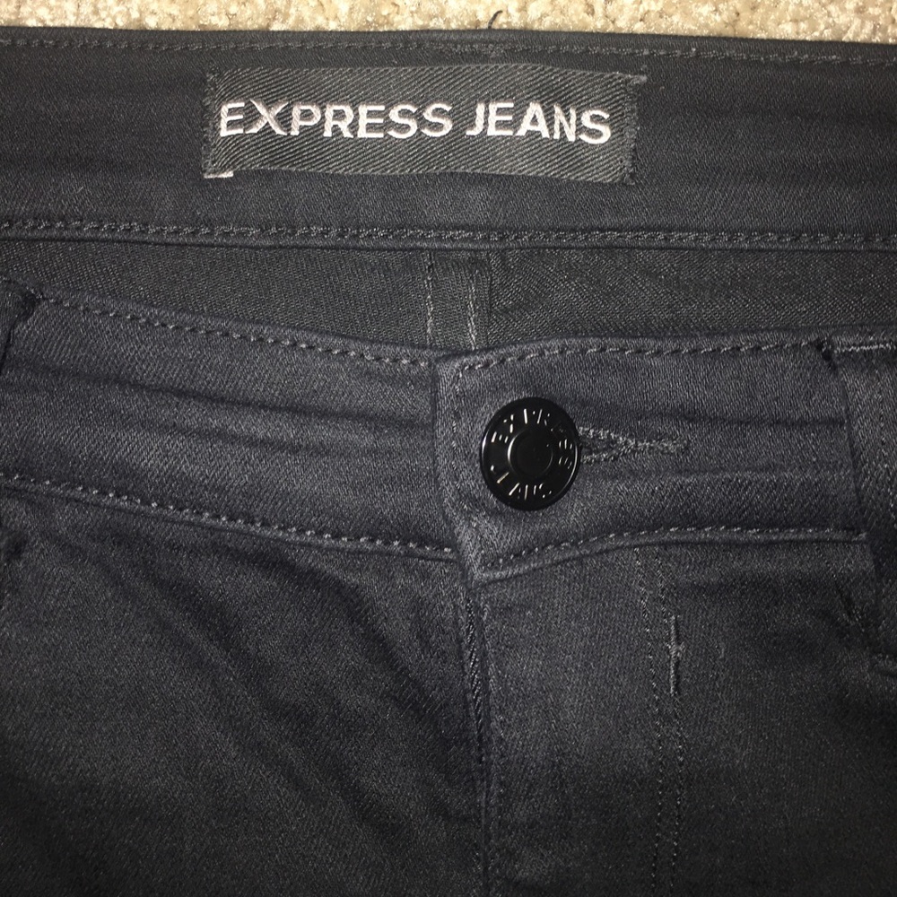 Plain black express skinny jeans