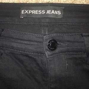 Plain black express skinny jeans