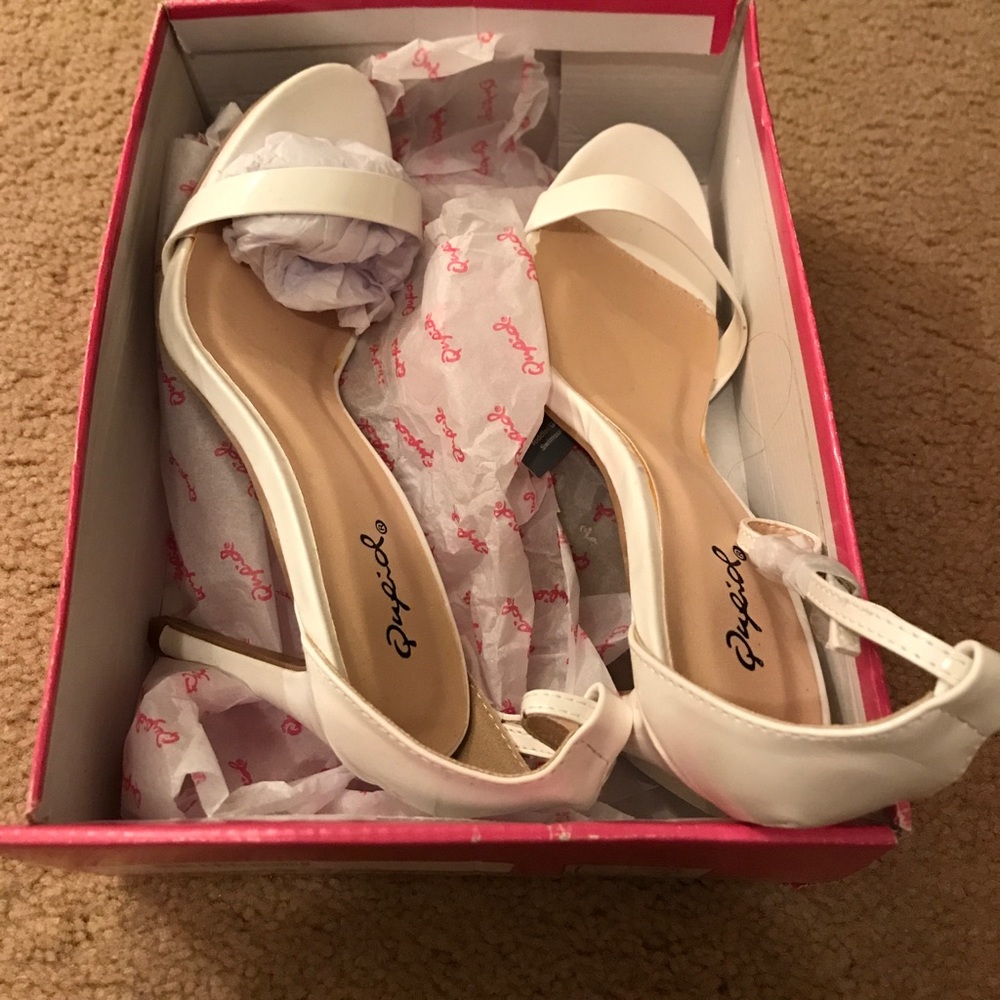 White ankle strap heels