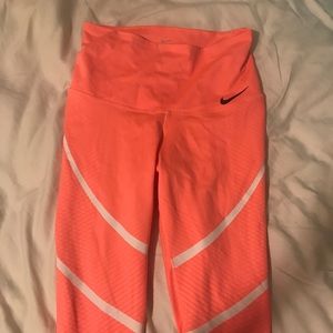 Neon pink Nike zonal tights