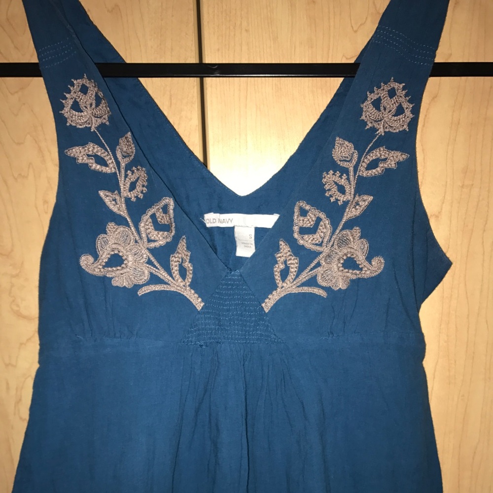 Blue v cut dress.