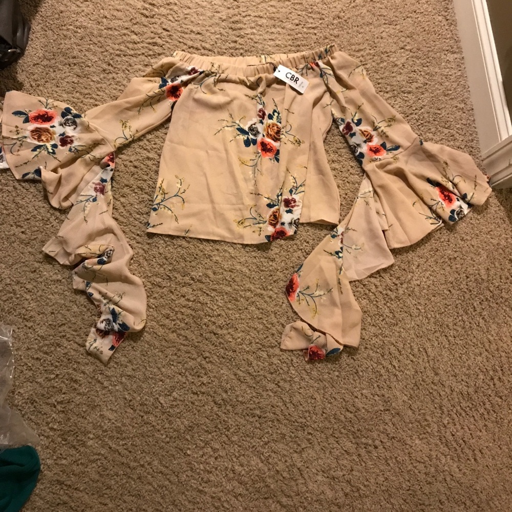 Soft pink off shoulder shirt