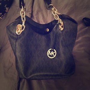 Black monogrammed Michael Kors leather tote bag