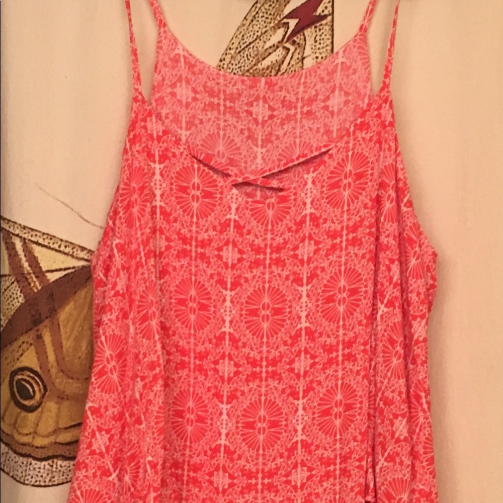 Orange and white print top