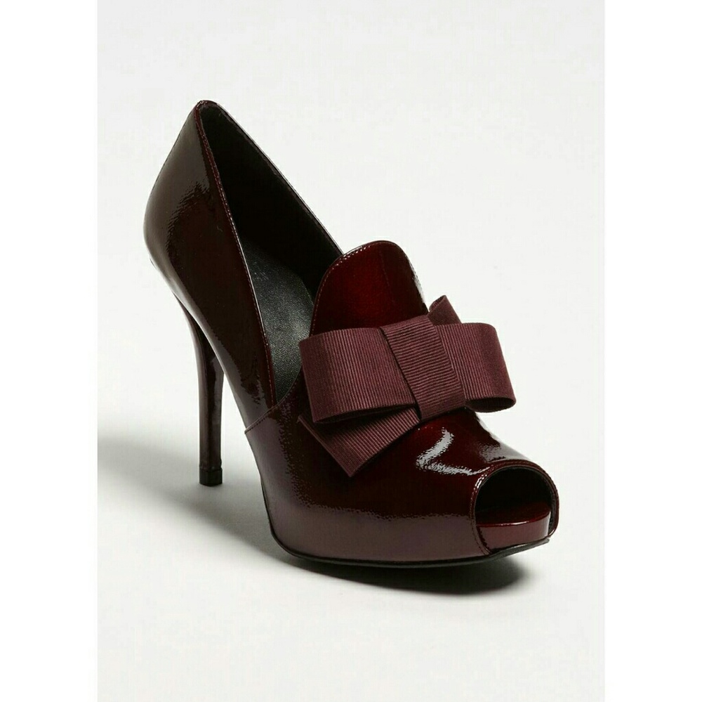 Stuart Weitzman Bowtie in wine pebble patent