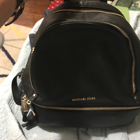 Michael Kors back pack/ purse