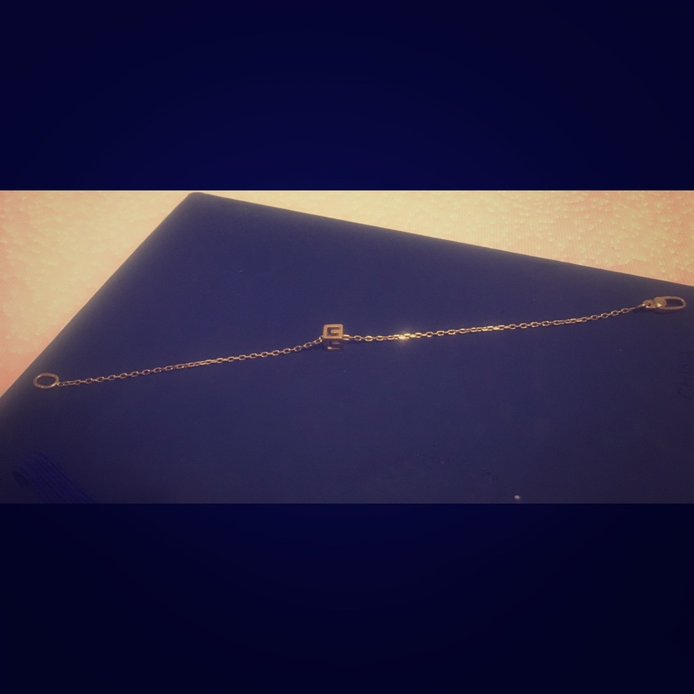 Gucci 18k yellow gold g cube bracelet