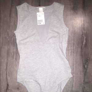 Grey bodysuit from H&M with neckline mesh detail